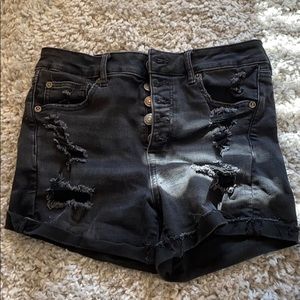 ripped black jean shorts.